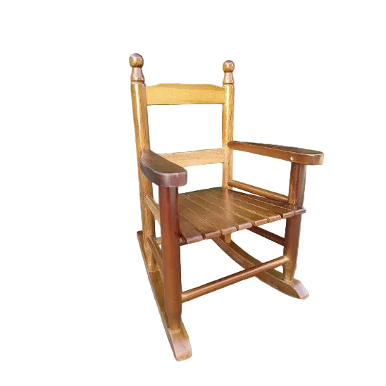 Children's solid oak wooden rocking chair with slatted backrest in a nursery setting